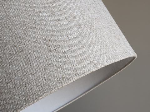 close up of bottom edge of handmade lamp shade in Calacatta Gold Flax fabric