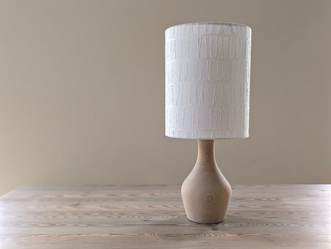 white textured paper lamp shade with geometric pattern 