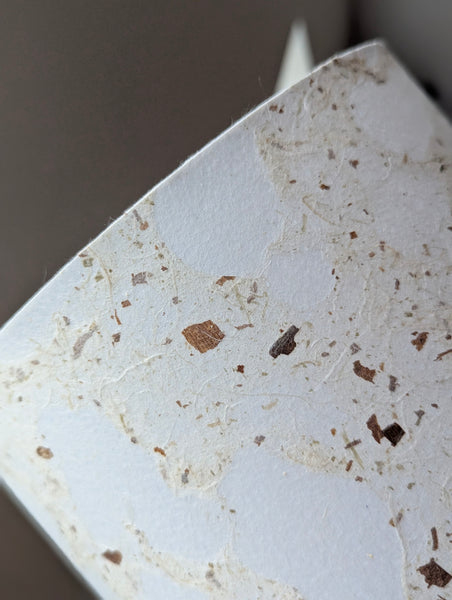 modern pebbled paper lampshade with textured paper in white and cream colorway