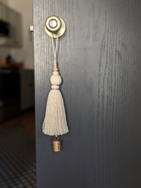 oversized modern boho tassel in cotton with wooden beads and a brass bell