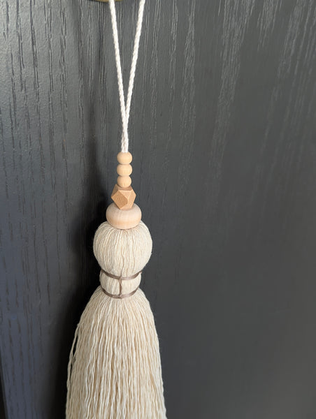 oversized modern boho tassel in cotton with wooden beads and a brass bell