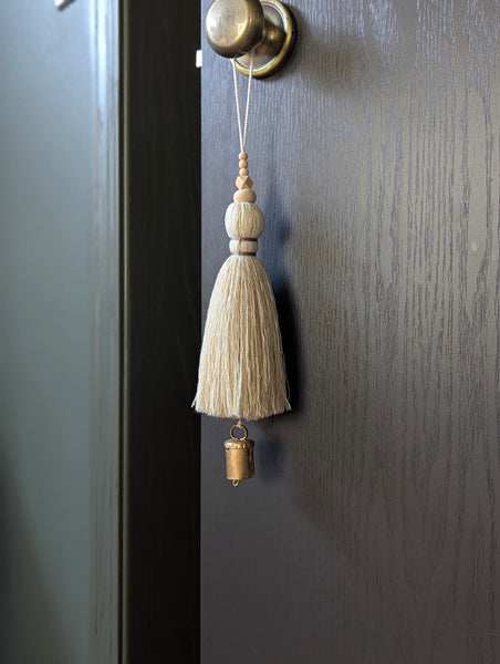 oversized modern boho tassel in cotton with wooden beads and a brass bell