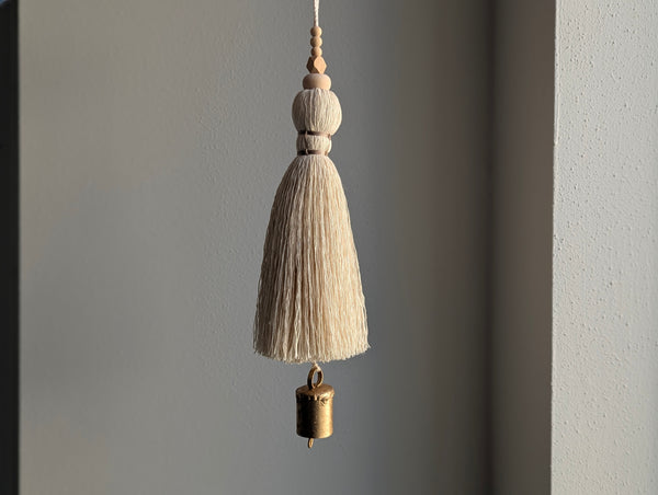 oversized modern boho tassel in cotton with wooden beads and a brass bead