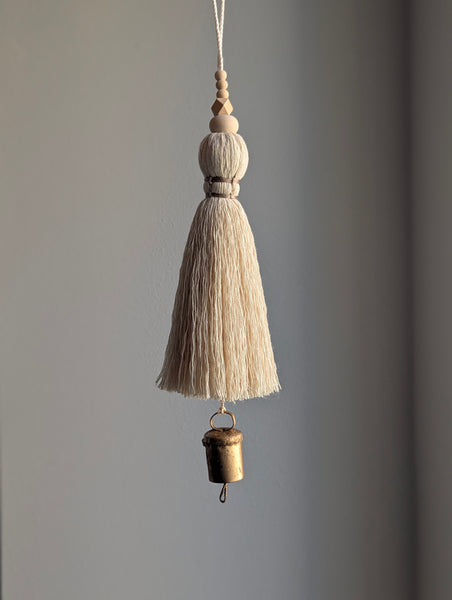 oversized modern boho tassel in cotton with wooden beads and a brass bell