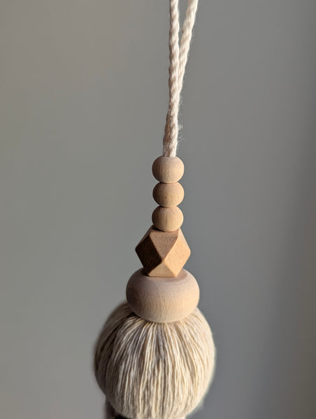 oversized modern boho tassel in cotton with wooden beads and a brass bell