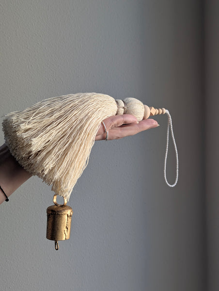 oversized modern boho tassel in cotton with wooden beads and a brass bell
