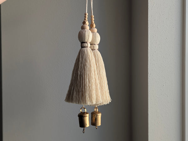 oversized modern boho tassel in cotton with wooden beads and a brass bell