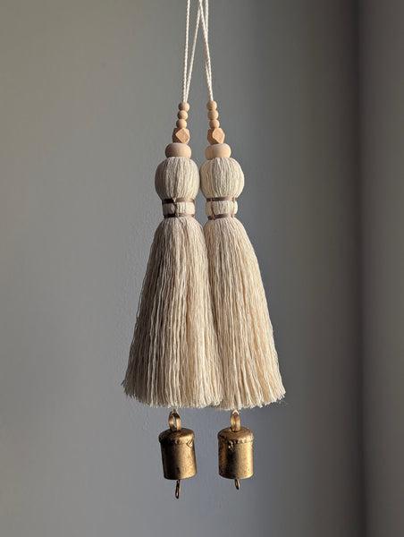 oversized modern boho tassel in cotton with wooden beads and a brass bell