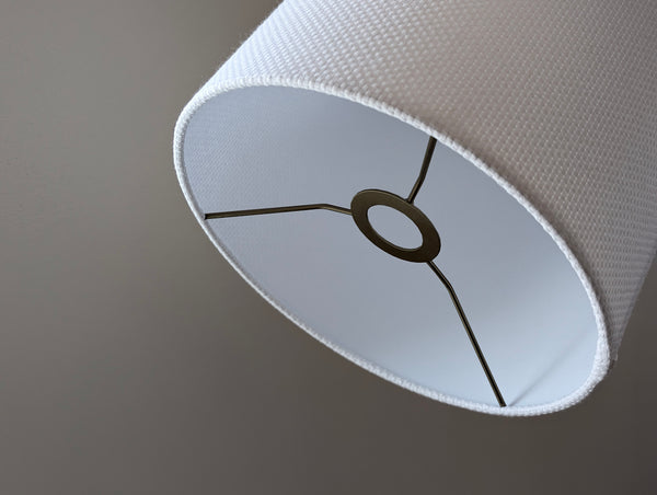 Close-up of the white crosshatch lamp shade with euro fitter
