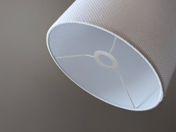 Close-up of the white crosshatch lamp shade with euro fitter