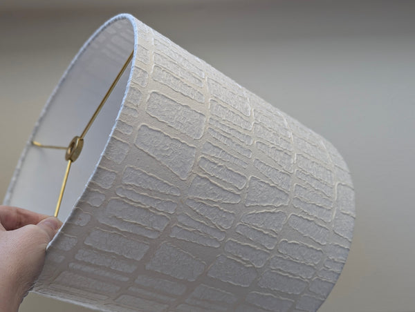 white textured paper lamp shade with geometric pattern 