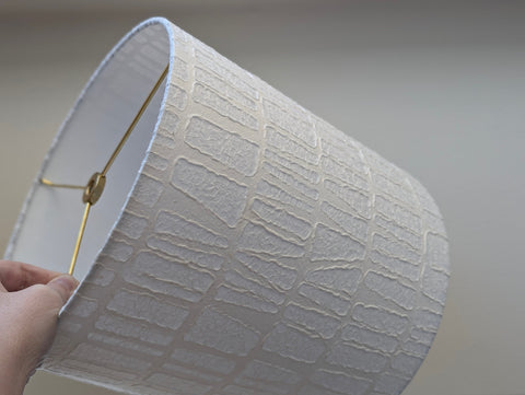 white textured paper lamp shade with geometric pattern 