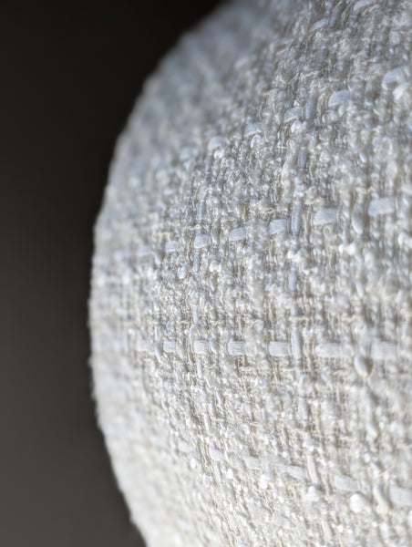 close up of textured boucle fabric lamp shade