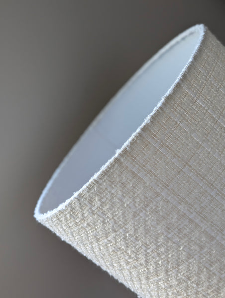 close up of textured lampshade in boucle