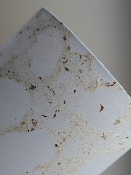 modern pebbled paper lampshade with textured paper in white and cream colorway