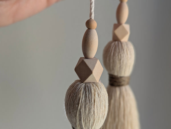 large double tassel with wooden beads and tan twine for hanging on door knobs or cabinet knobs