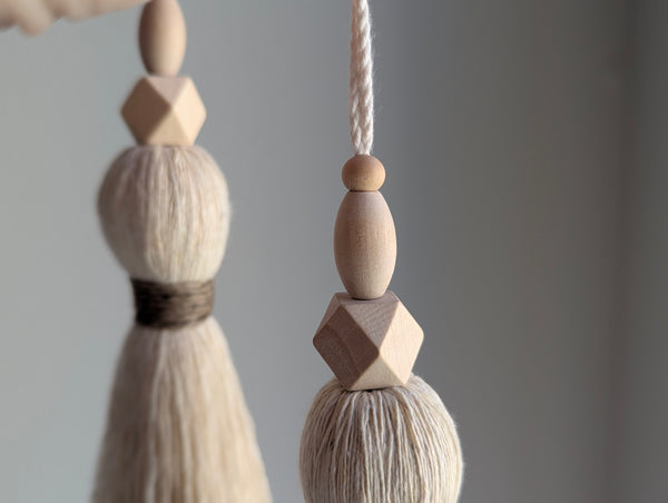 large double tassel with wooden beads and tan twine for hanging on door knobs or cabinet knobs