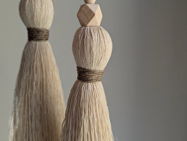 large double tassel with wooden beads and tan twine for hanging on door knobs or cabinet knobs