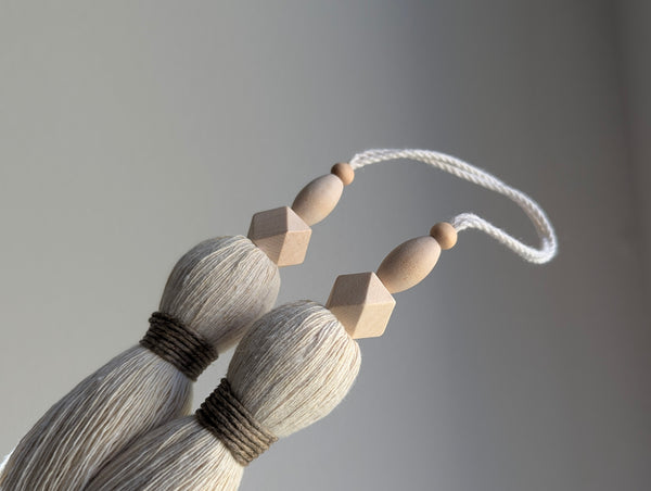 large double tassel with wooden beads and tan twine for hanging on door knobs or cabinet knobs