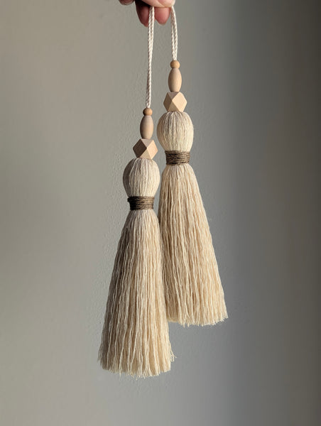 large double tassel with wooden beads and tan twine for hanging on door knobs or cabinet knobs