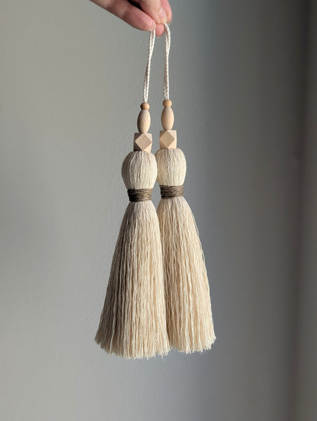 large double tassel with wooden beads and tan twine for hanging on door knobs or cabinet knobs