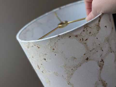 modern pebbled paper lampshade with textured paper in white and cream colorway