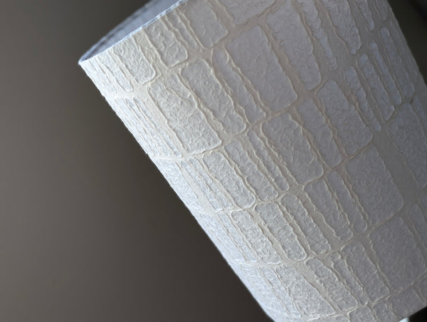 white textured paper lamp shade with rectangular pattern