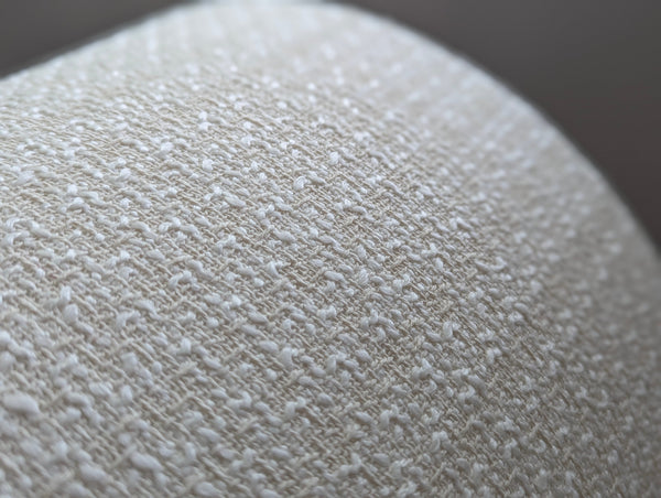 close up of mid-mod boucle fabric on lamp shade
