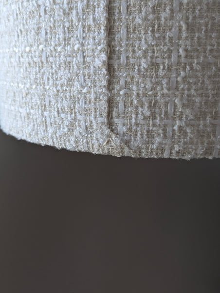 close up of back seam of tweed boucle lamp shade in ivory