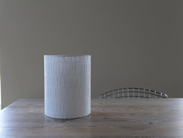 white textured paper lamp shade with geometric pattern 