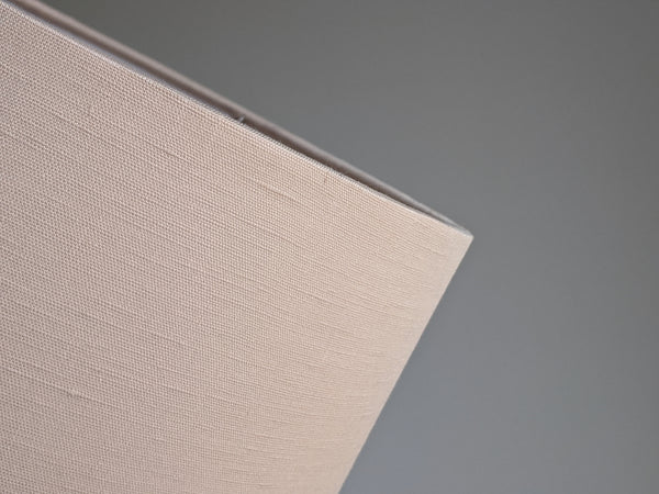 Close up of blush linen fabric on handmade lamp shade by Ud Form in Madison, WI.