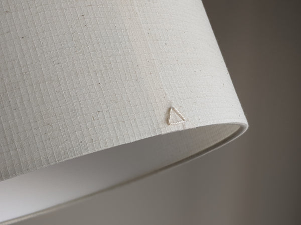 close up of triangle stitch detail on back of handmade Grid Ecru lamp shade by Ud Form