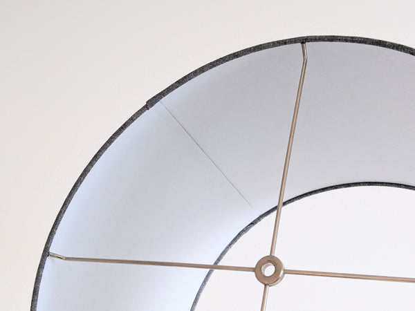 this image shows the interior lining of this handmade lamp shade featuring the top hardware and back seam