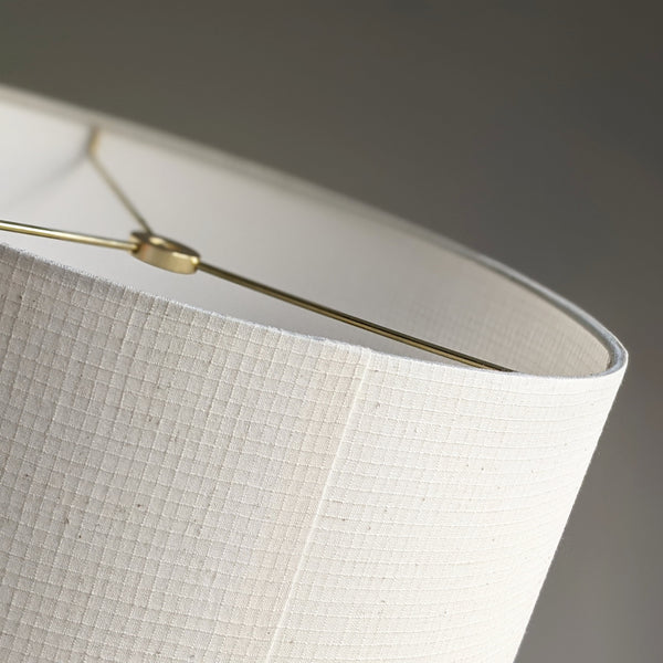 close up of seam detail on handmade lamp shade in Grid Ecru fabric