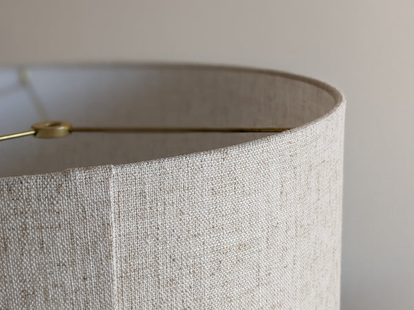 close up of top edge detail near back seam of Calacatta Gold Flax lamp shade with brass hardware